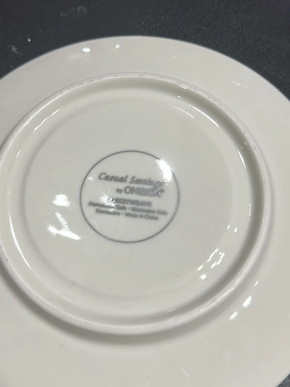 Set of 7 basket weave by Oneida saucers
